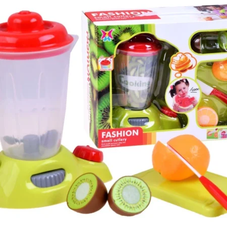 turmixgép vágódeszkával és gyümölcsökkel